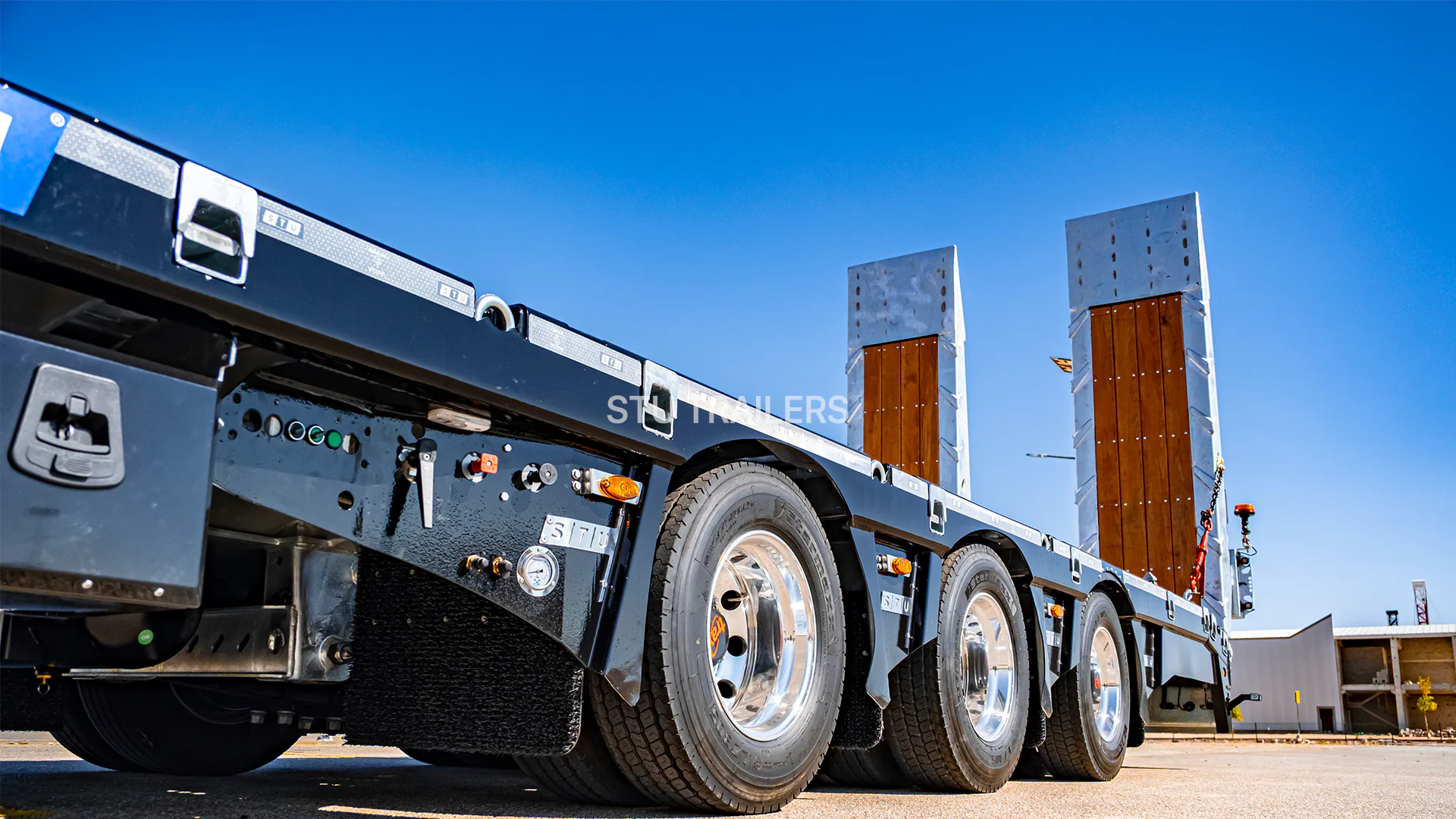 Multiple axle layout drawbar trailer configured for payload distribution and stable road tracking. — STU Trailers